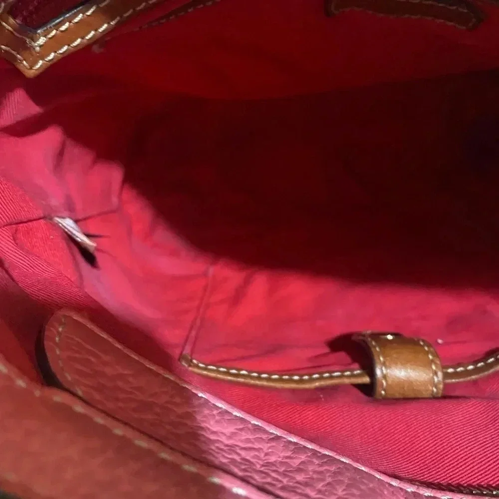 Dooney Bourke pink pebbled leather hobo handbag
